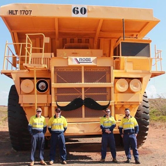 A large vehicle with a moustache on the front of it.