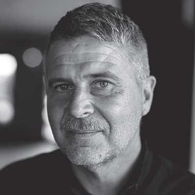 Travis Garone Non-Executive Director