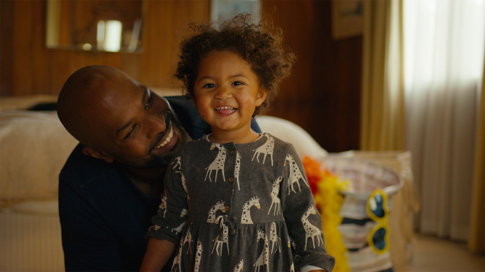 Photo of a father and daughter.